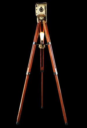 Tripod light with vintage camera front view