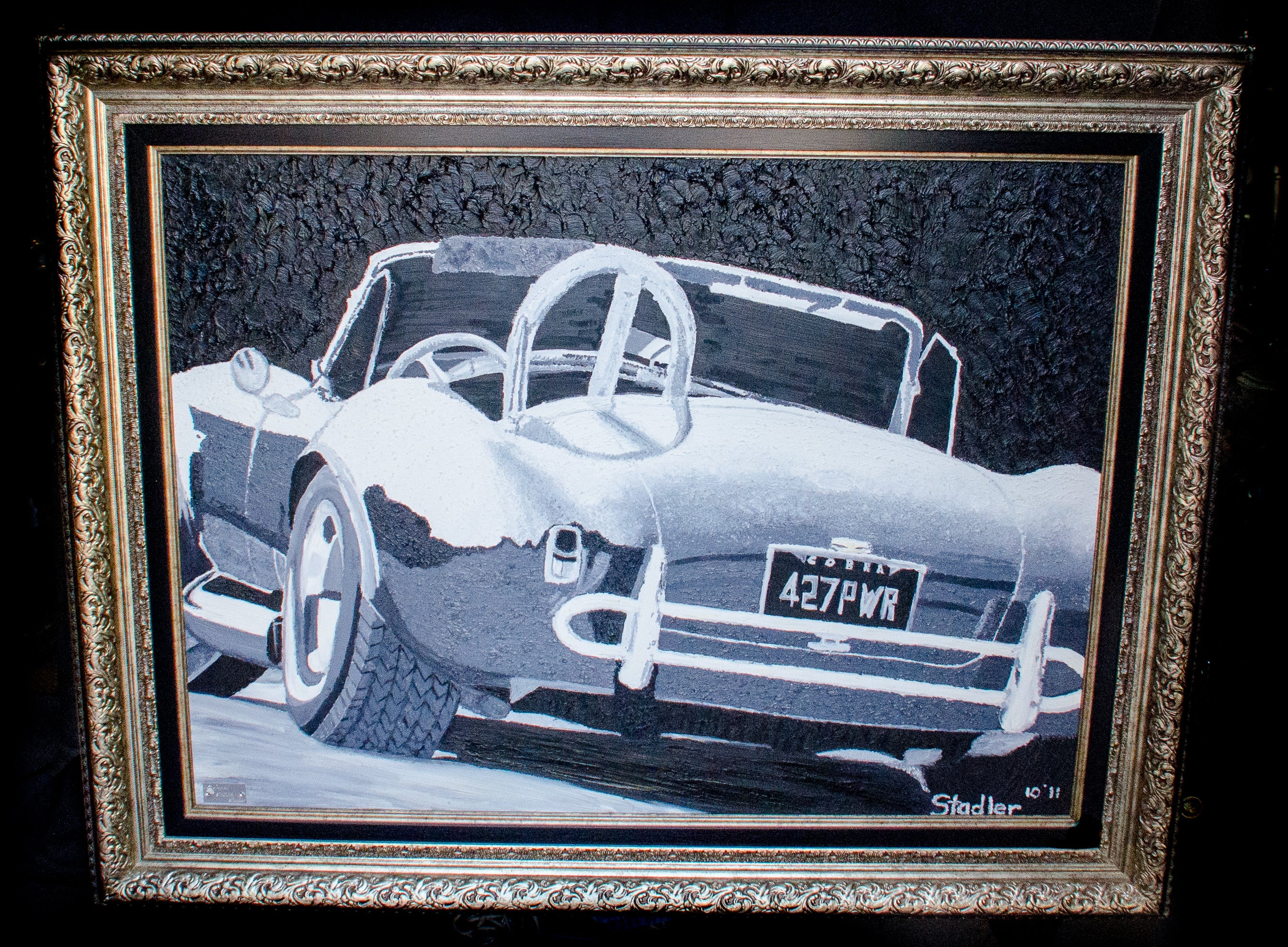 Black and white oil painting of classic car with frame